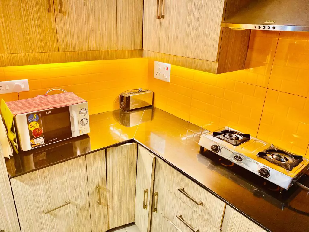 fully equipped kitchen service apartment