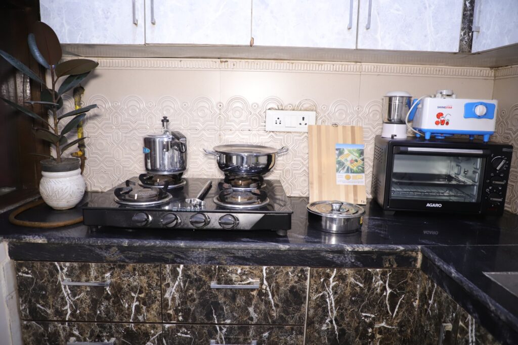 Service Apartment in Saket furnished kitchen